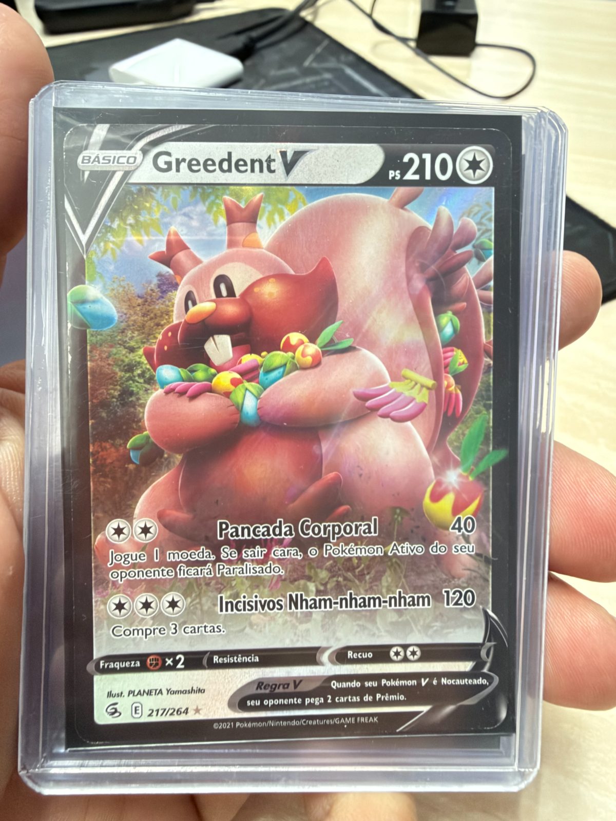 Frente da carta Greedent V